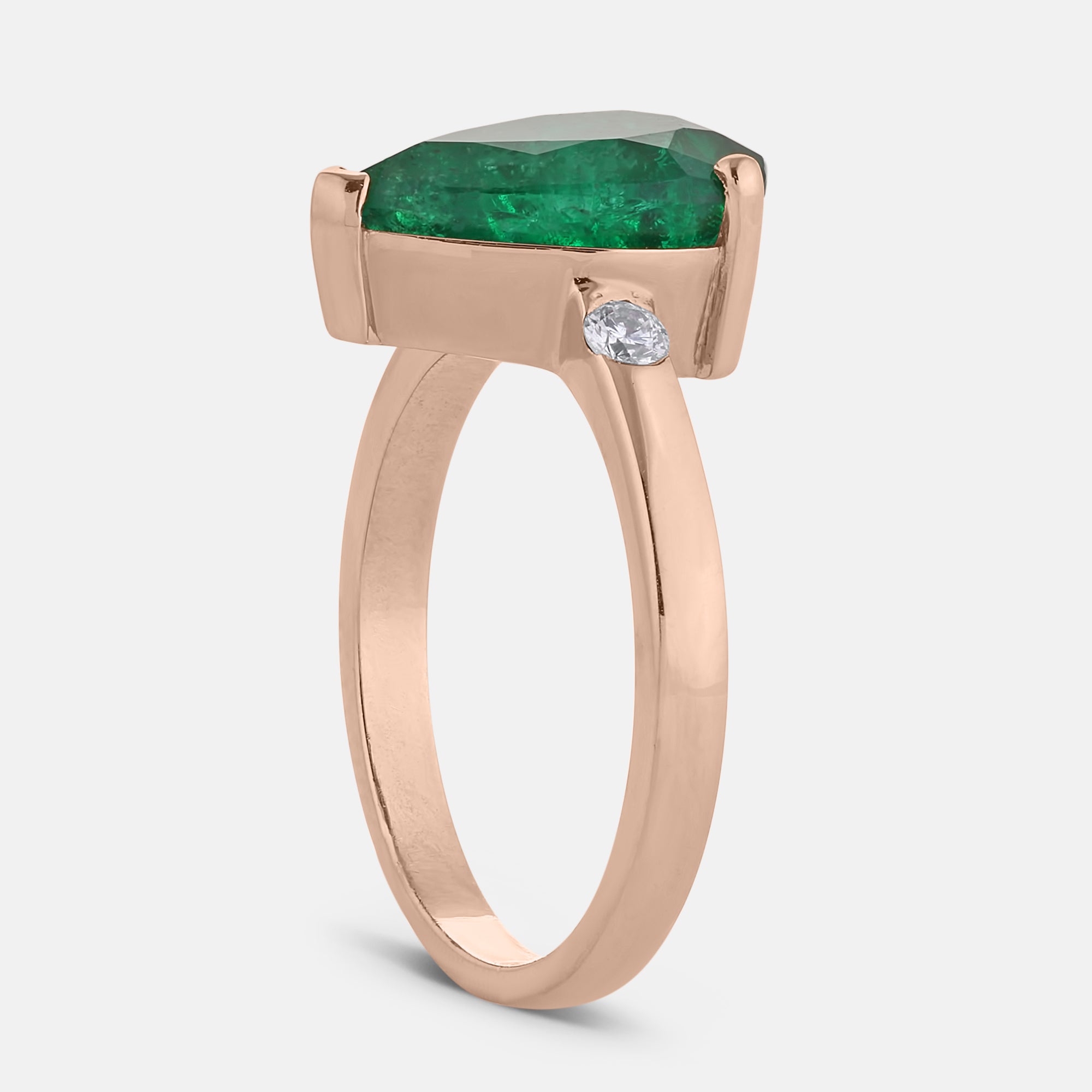 Bezel Pear Shaped Emerald Ring