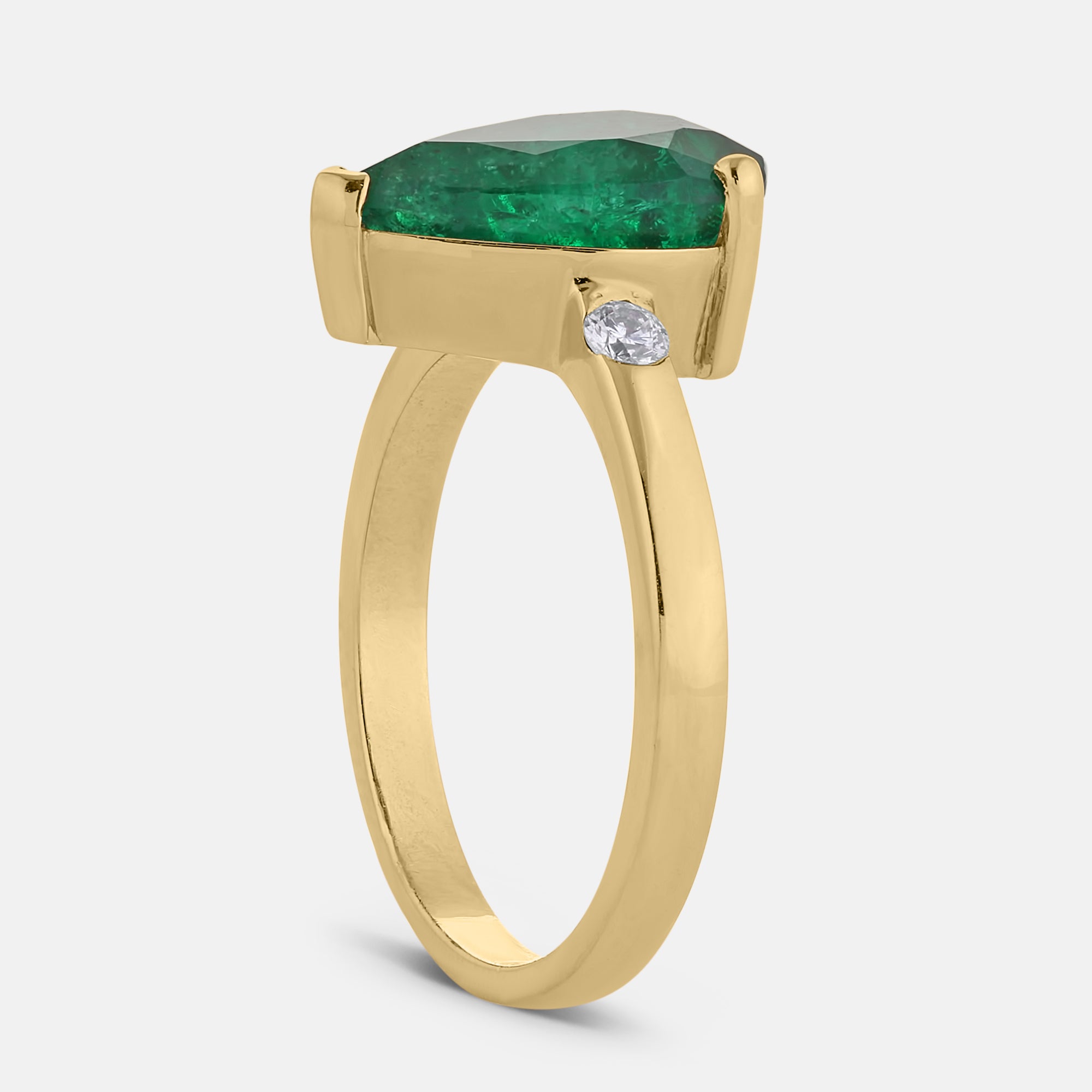 Bezel Pear Shaped Emerald Ring