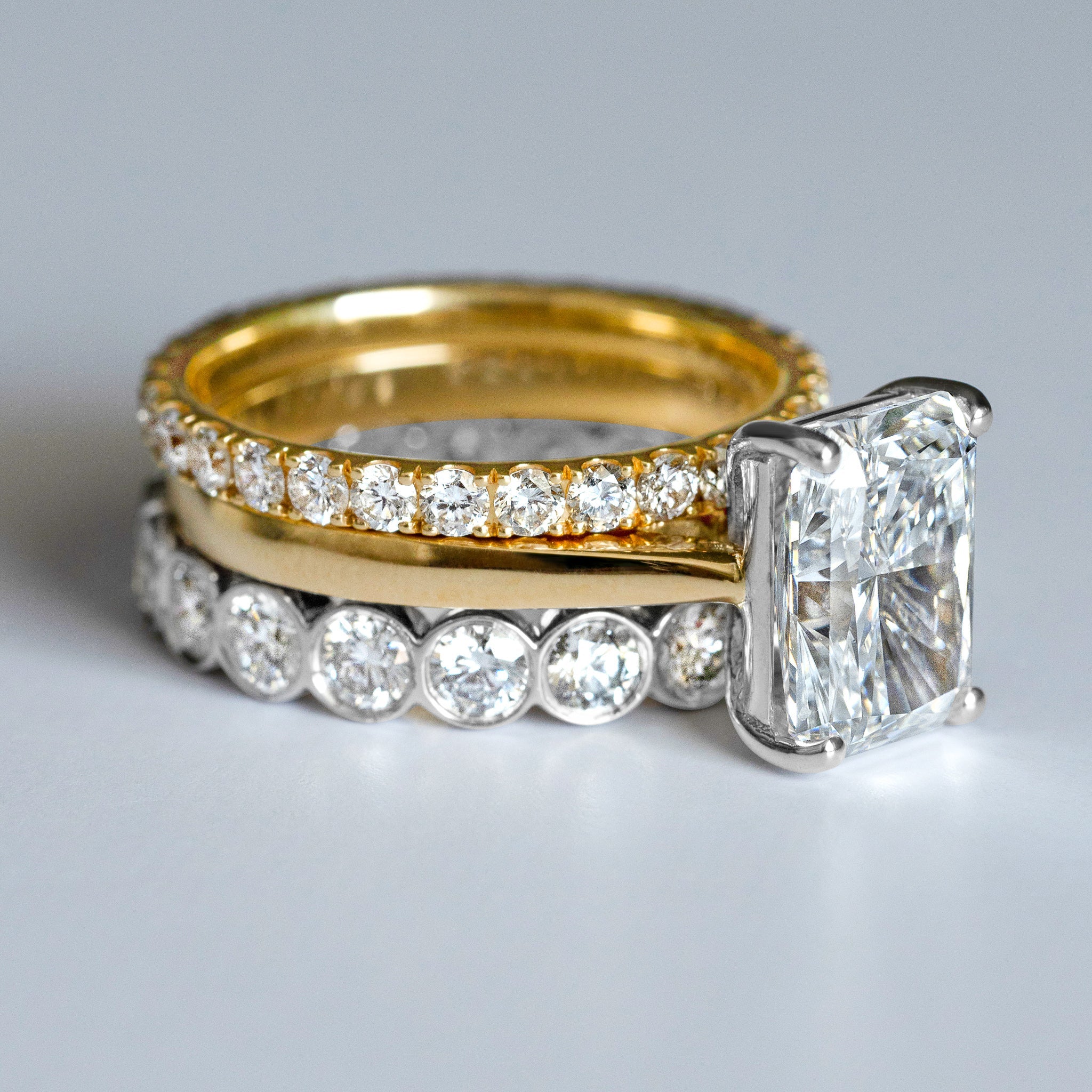 Woman wearing jewelry by Saint Stones, showcasing elegance and style.