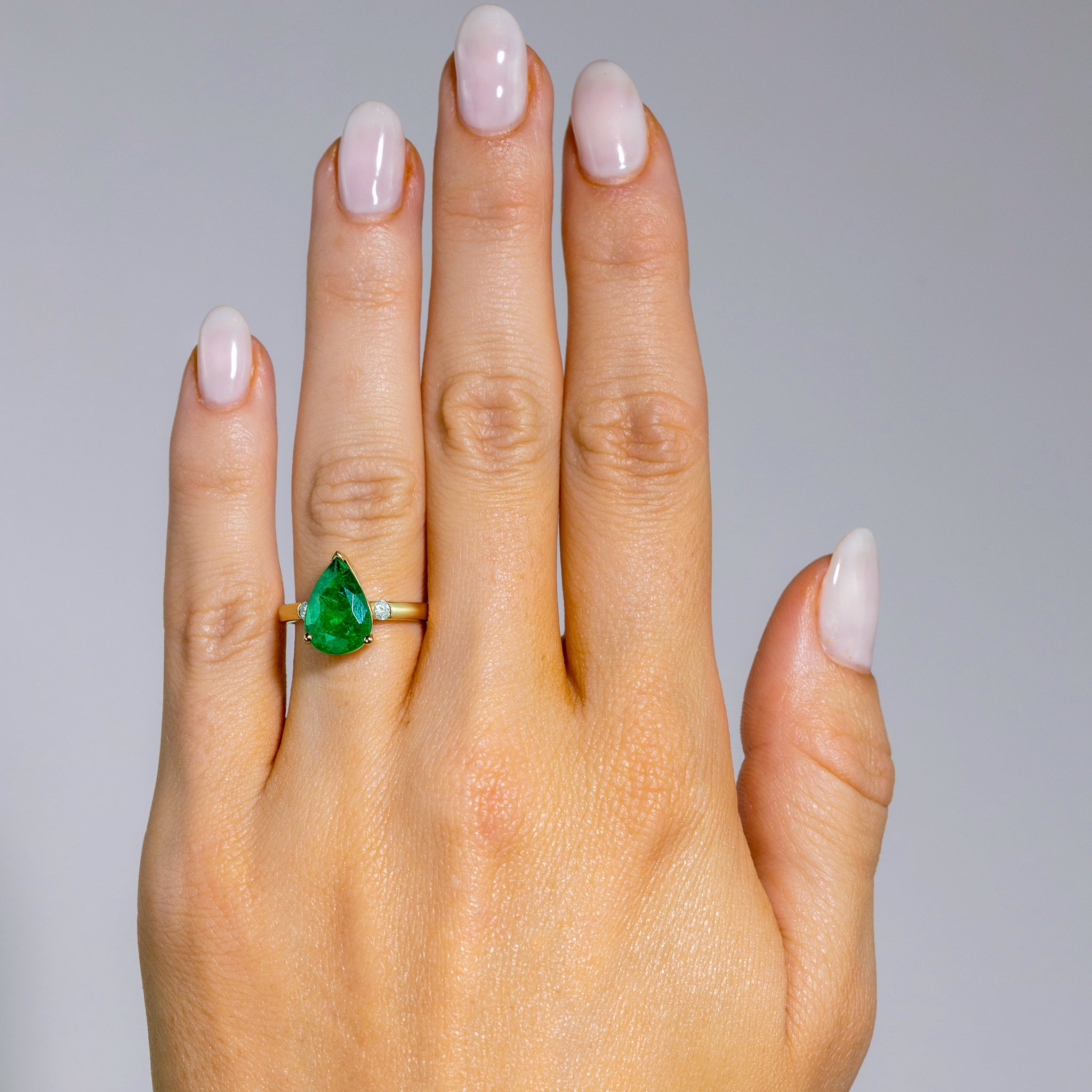 Bezel Pear Shaped Emerald Ring